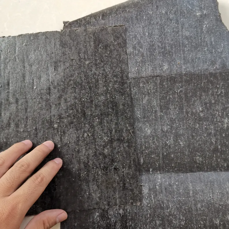 Pormenor do feltro asfáltico de base de papel