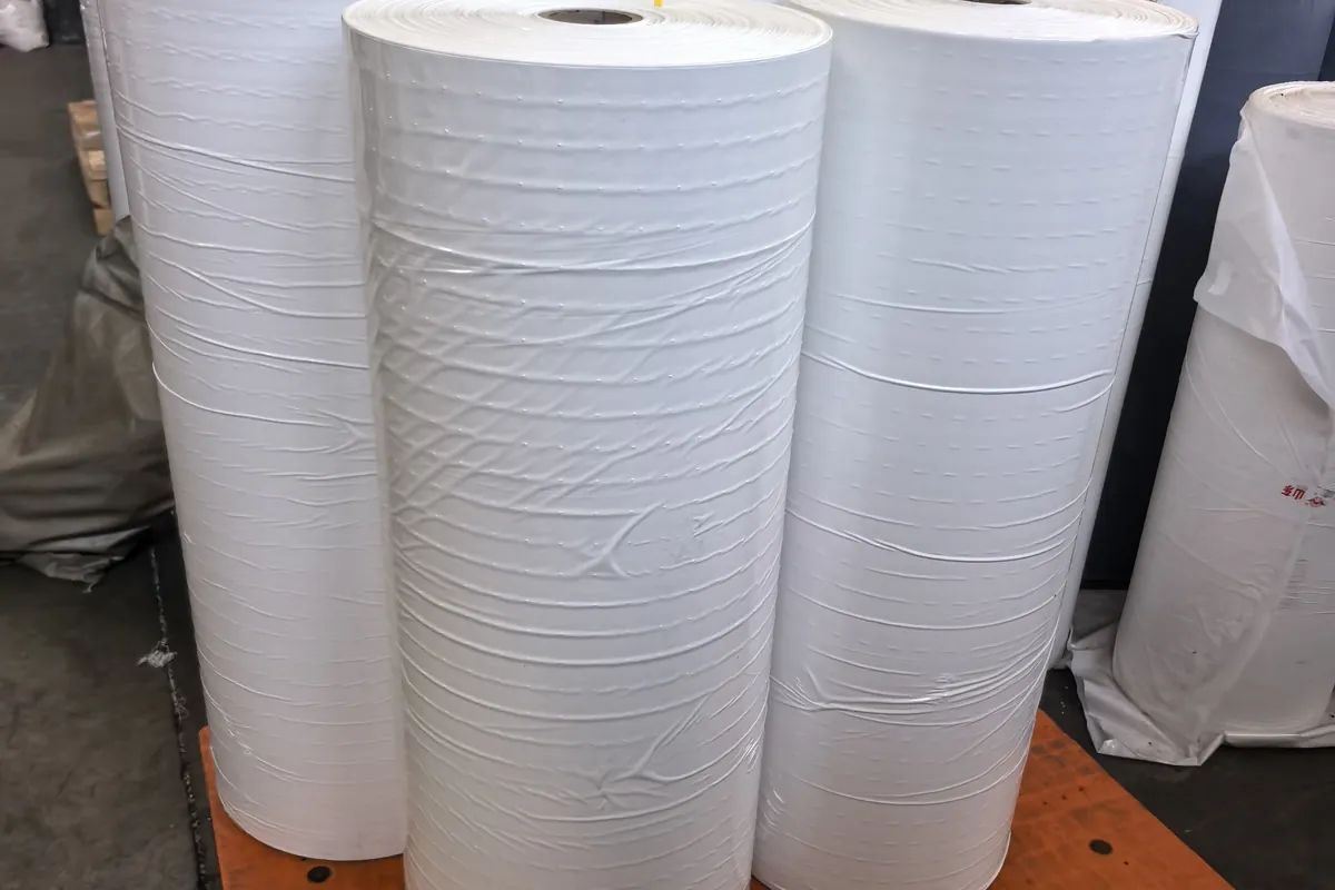 Wrapped polyester reinforcement rolls